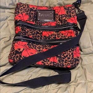 Betsy Johnson leopard and red bow crossbody bag